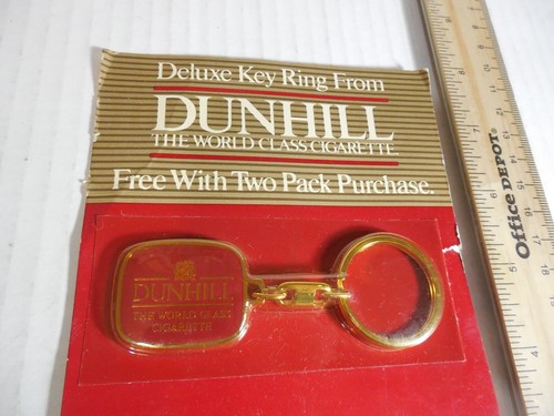 Dunhill La Clase Mundial Llavero Cigarrillo Vintage Promo Tono Dorado Llavero 1985 - Imagen 2 de 8