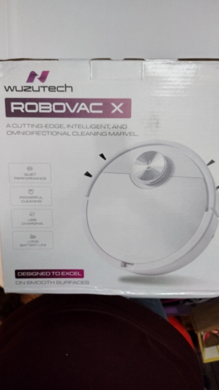 Robovac X, NIB. Smooth surface vacuum, 90 minute operation time. Box damaged.