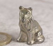 Rough Collie sitting white metal heavy ornament just over 1 inch tall sheltie