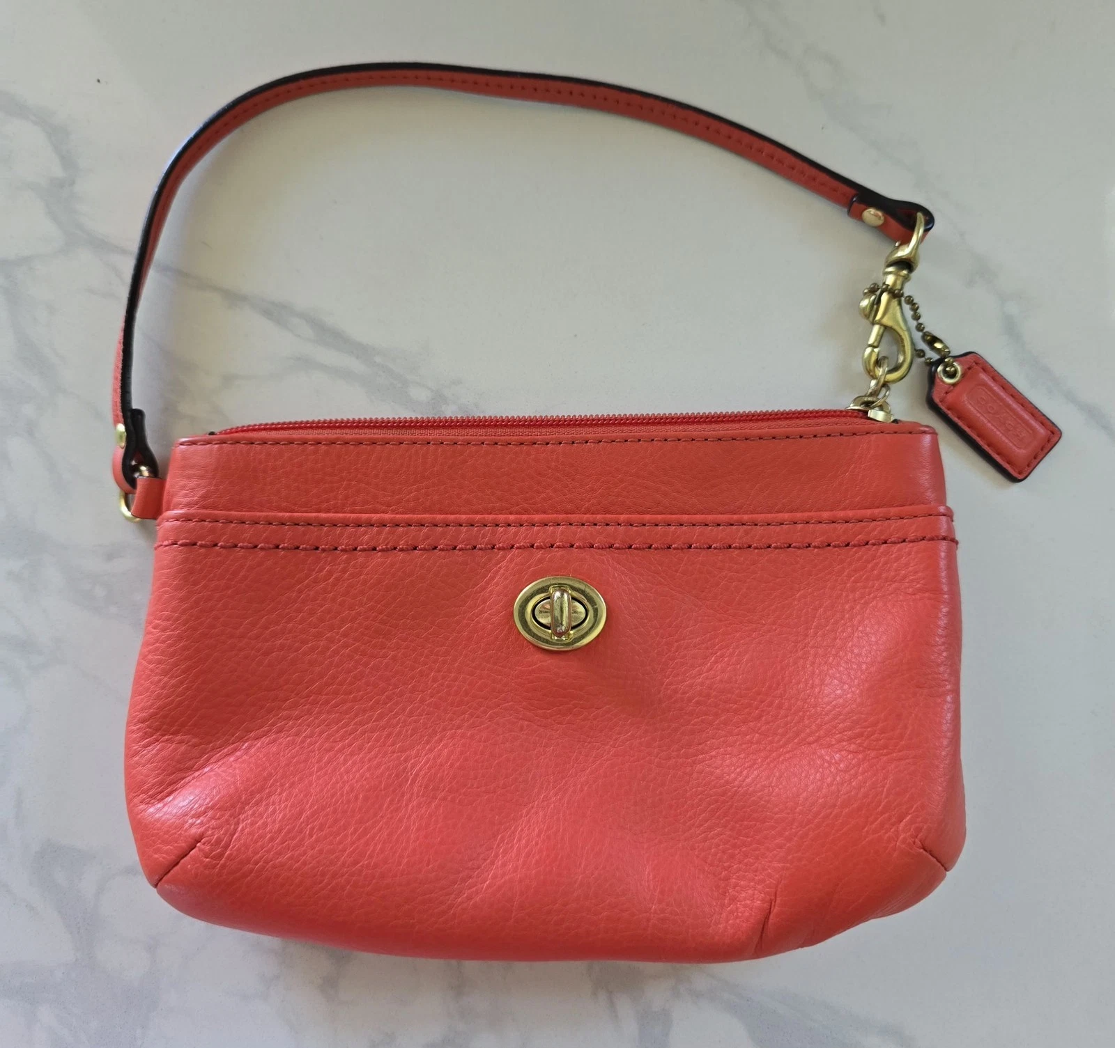 Polso medio vintage Coach F49472 Park arancione pelle chiusura girevole tasca
