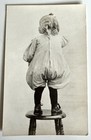 Gorgeous Photo POV From Behind Vintage RPPC Child Standing on Chair In Bloomers — photo 2