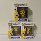 Funko Pop! Pokemon Pikachu Lot Of 3: Waving, Angry, Hands Down