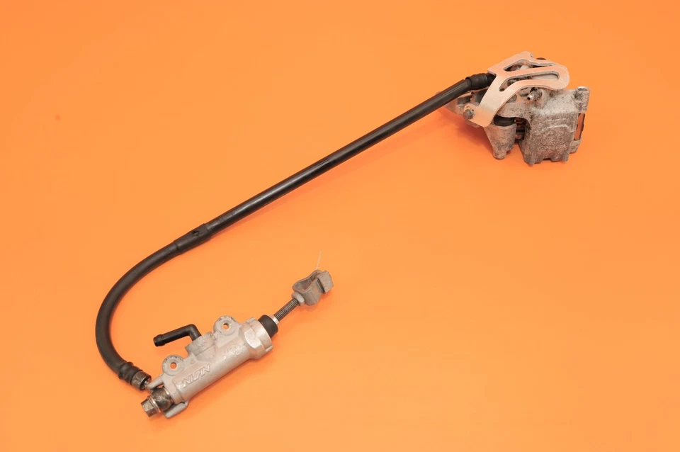 96-07 CR85R CR85 2003 OEM Pinza de freno trasera Soporte Cilindro maestro Manguera Palanca Foto 3 de 4
