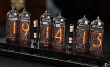 Home decor Nixie clock. In-14 tubes. 6 tubes. Carbon case. Warm shine of tubes.