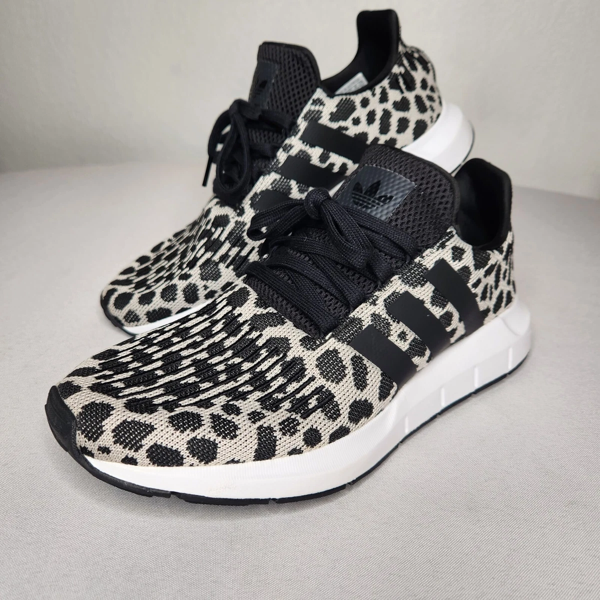Swift run black shop and white leopard
