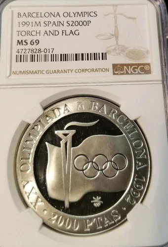 1991 SPAIN SILVER 2000 PESETAS TORCH AND FLAG NGC MS 69 TOP POP SCARCE