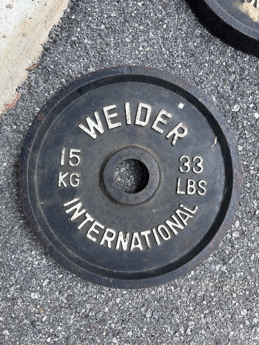 Weider International of 15kg 33lb Olympic plates Weight 2” Hole