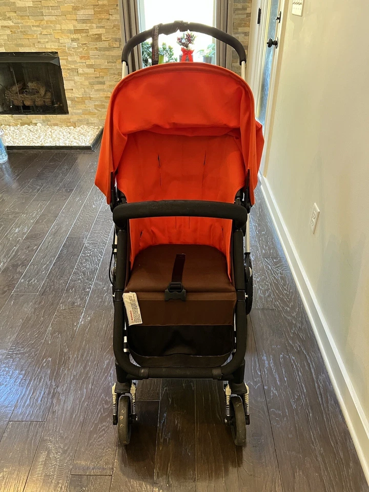 Cochecito de asiento individual sistema de viaje Bugaboo Cameleon marrón oscuro/naranja Foto 3 de 4