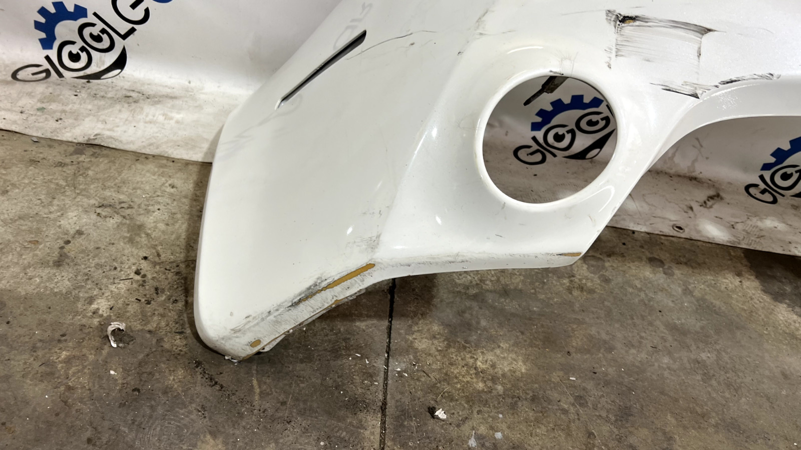 ASTON MARTIN VANTAGE V8 REAR BUMPER 2011 OEM -needs repaired at front edge-