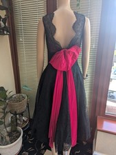 Designer 1950s Black Lace Cocktail Dress with Magenta Bow & Bust – Vintage