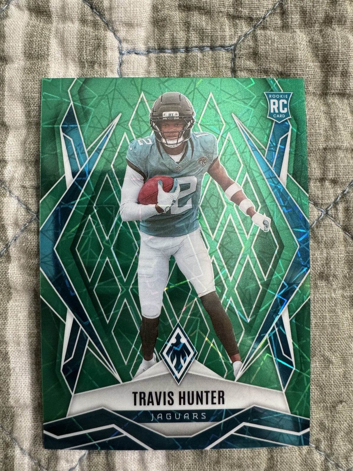 2025 Panini Phoenix Rookie Travis Hunter #157 Green Lazer /49 RC Jaguars