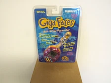 1997 Tiger Electronics Giga Faces Virtual LCD Game Factory Sealed