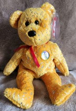 TY Beanie Babies 10 YEAR ANNIVERSARY DECADE YELLOW BEAR 8.5 INCH 2003