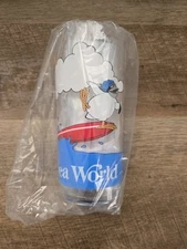 Vintage Sea World Collectible Cup (1988) With Surfing Penguin Inflatable. New! 