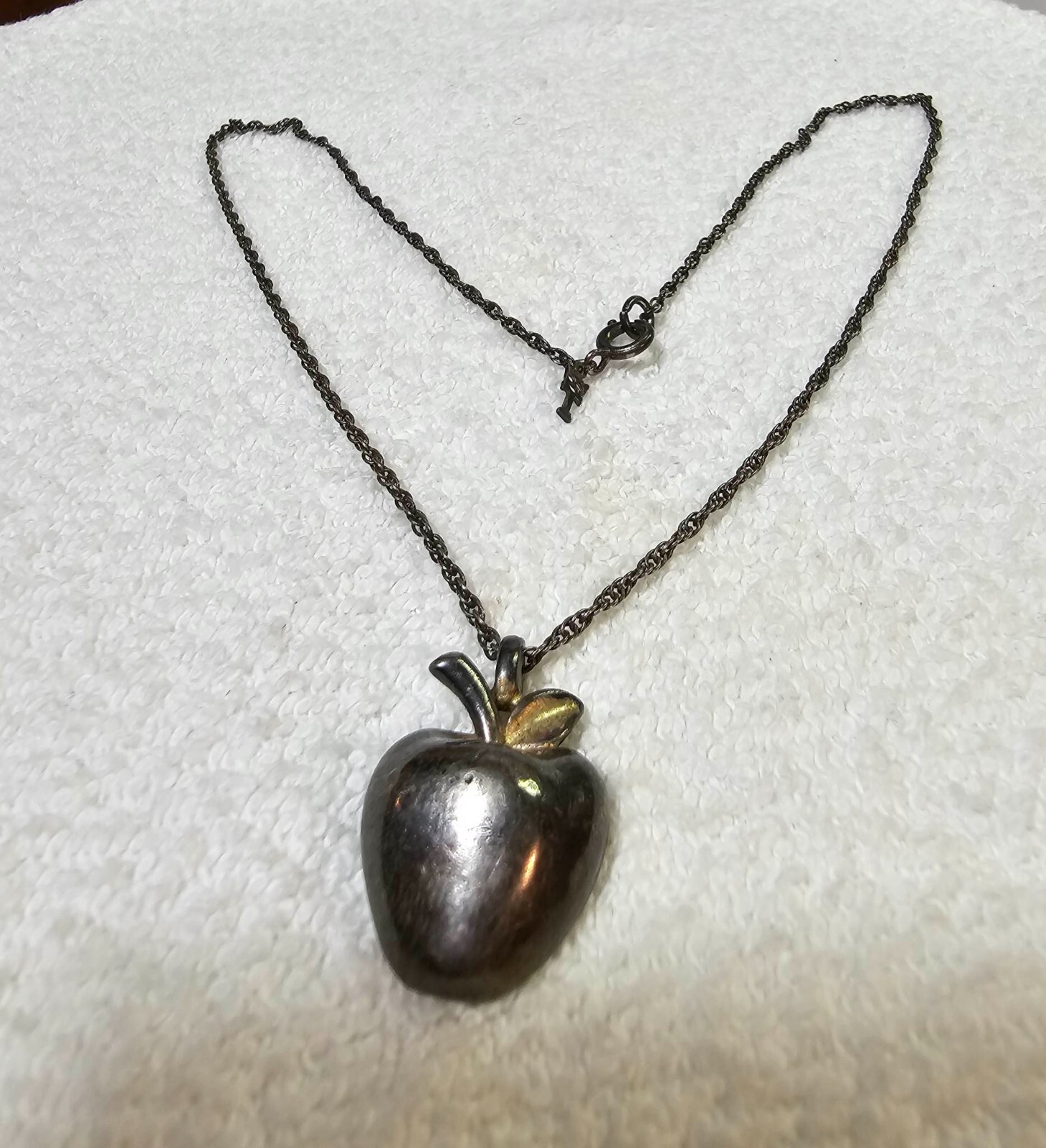 Signed trifari Silvertone solid apple pendant w/ … - image 1