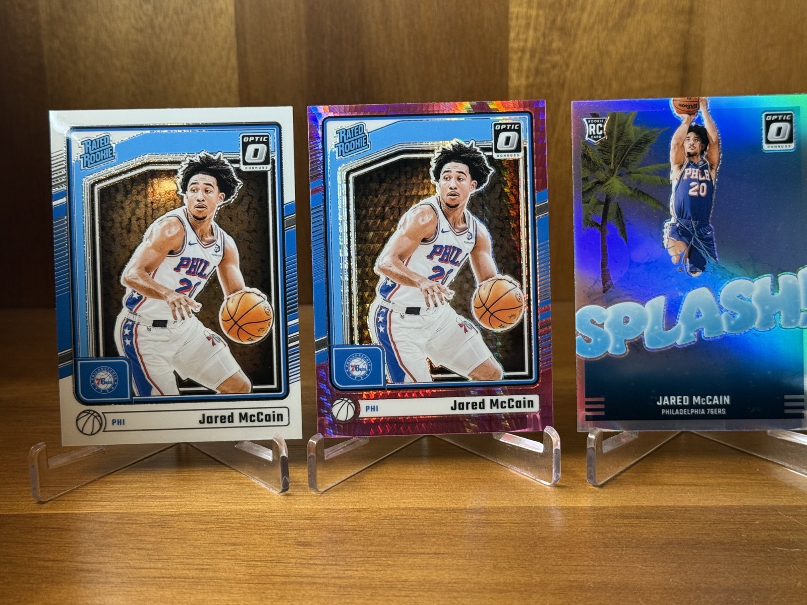 2024-25 Optic Jared McCain Rated Rookie Hyper Pink RC #270 + Silver Splash 76ers