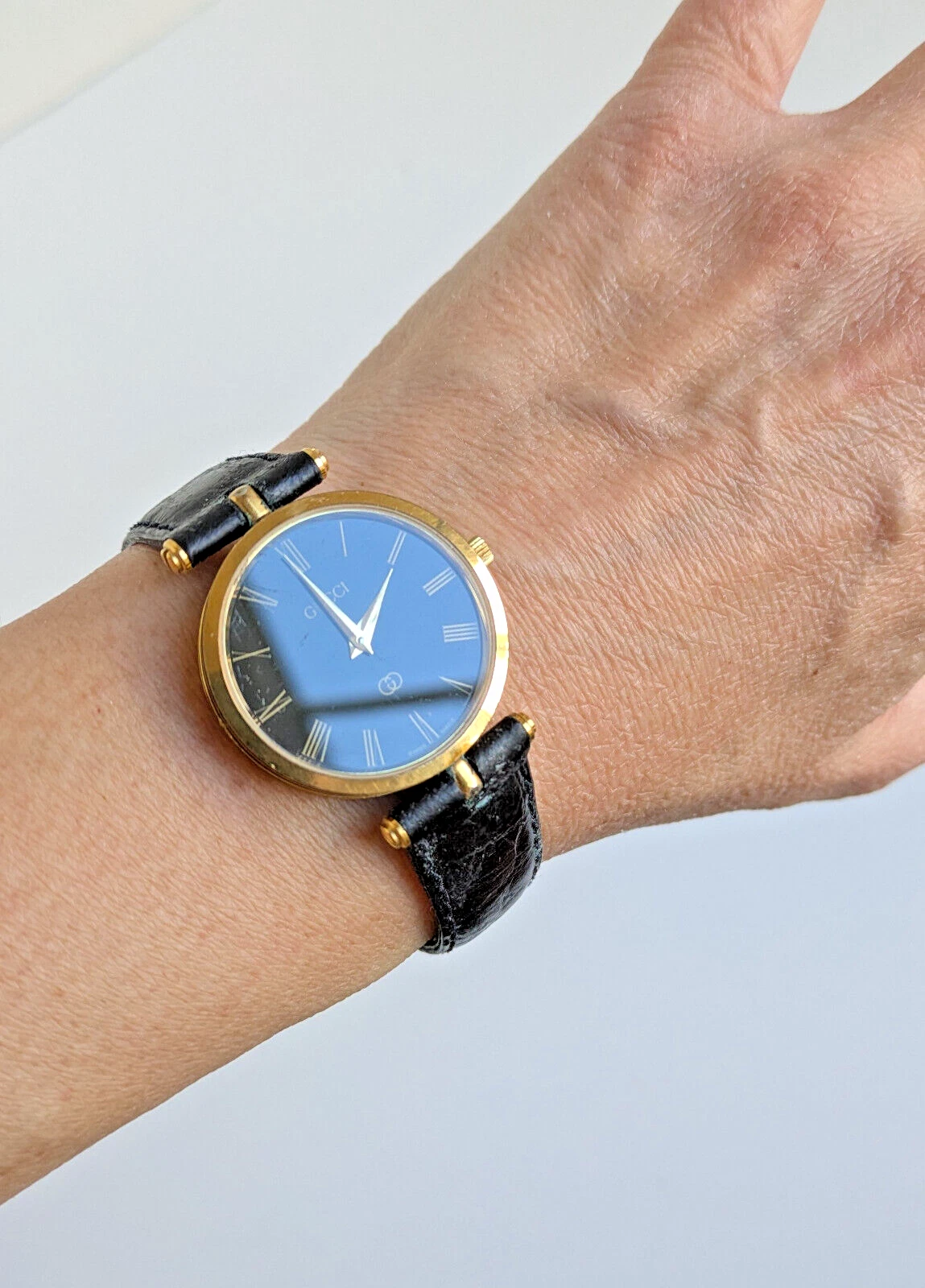 Montre bracelet analogique vintage pour femme GUCCI Swiss Made chiffres romains a besoin d'une pile