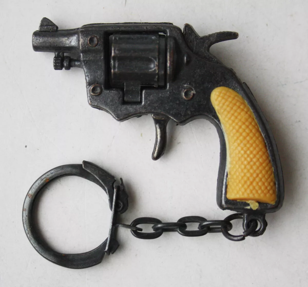 Mini cap gun best sale keychain