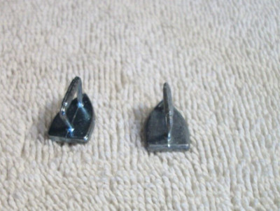 Two Monopoly Iron Token