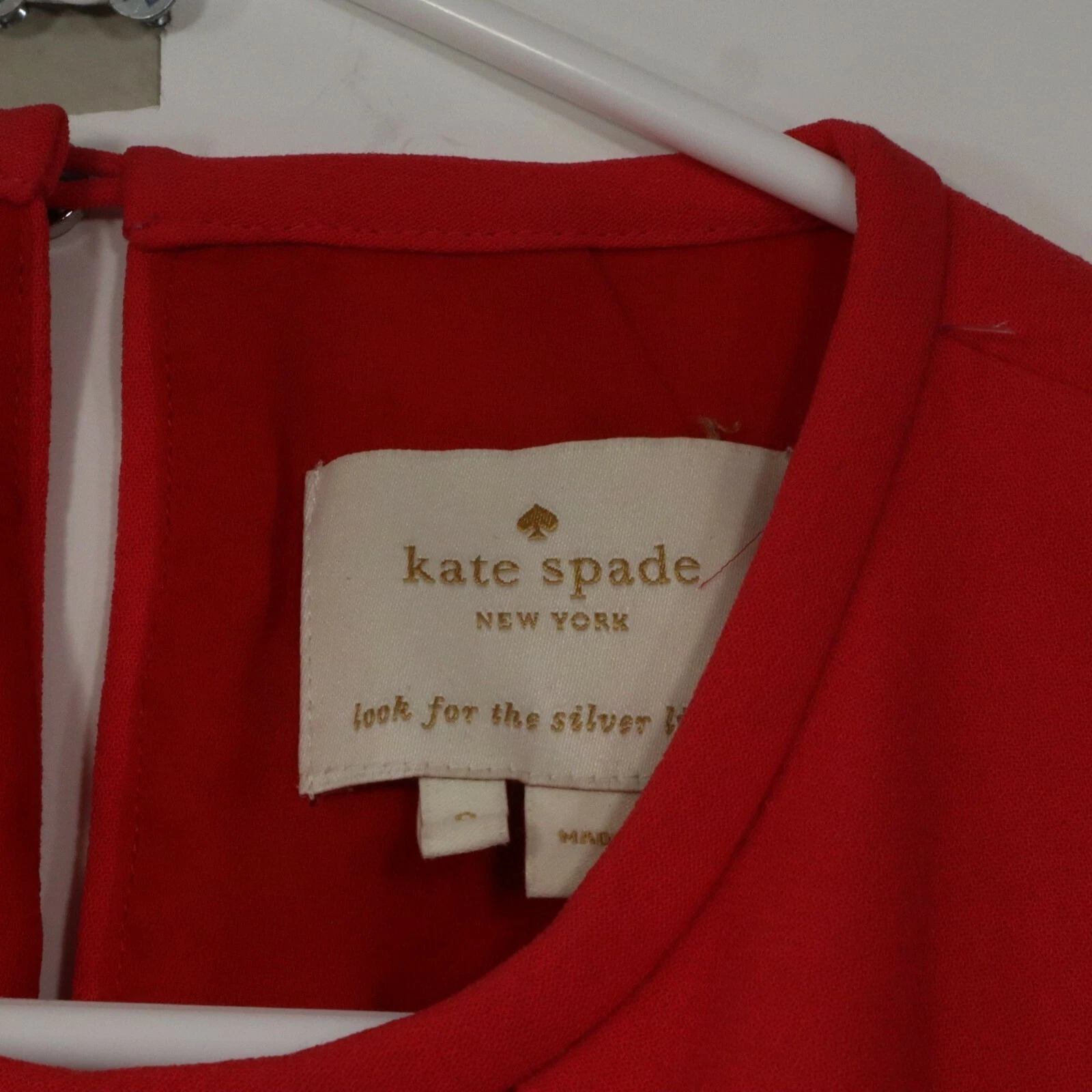 Abito rosso senza maniche Kate Spade 2 tasche dietro bottoni taglia 0 girocollo