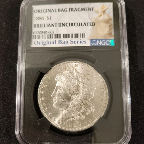 1886 Morgan Dollar, Origional Bag Fragment NGC Slabbed