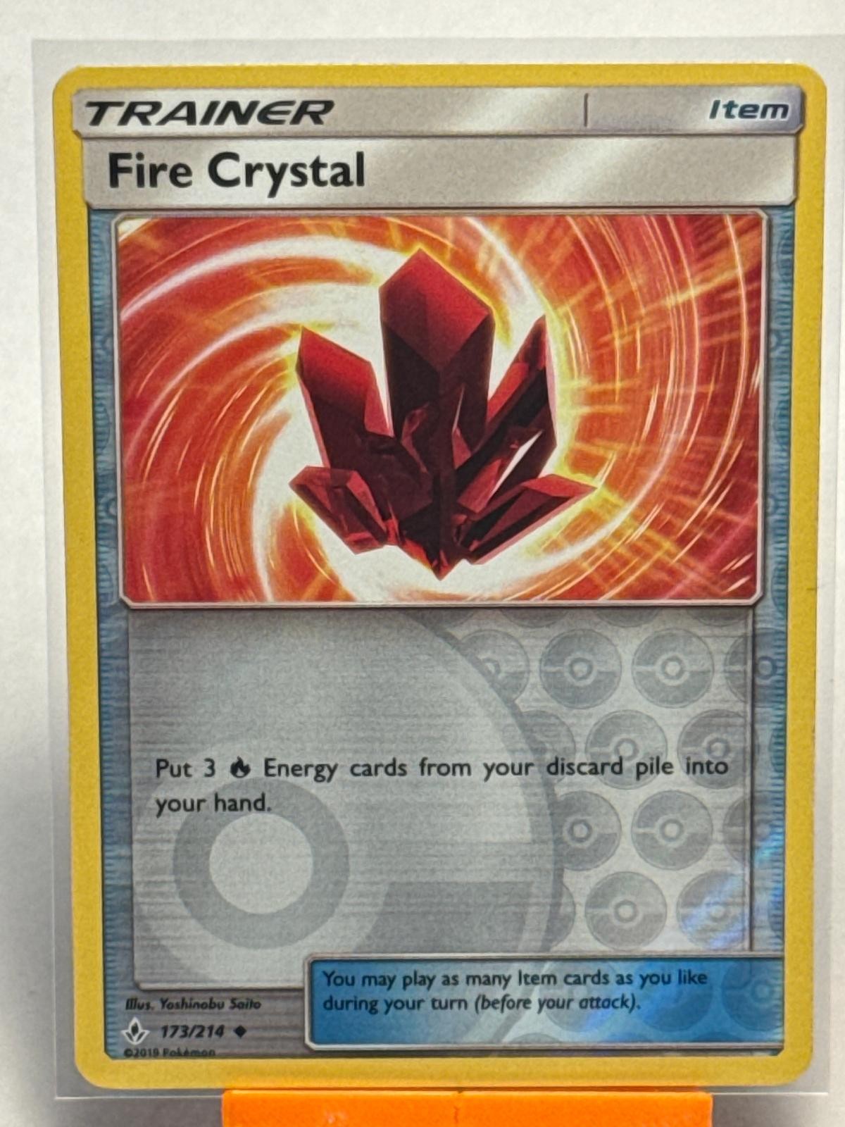 Fire Crystal 173/214 Uncommon Unbroken Bonds Pokemon Reverse Holo Lightly Played