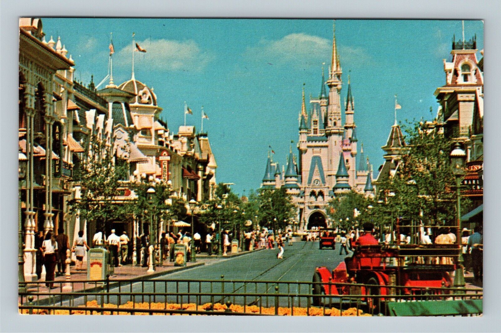 Vintage Disney World Orlando postcard featuring Main Street and Cinderella Castle