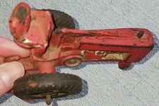 VINTAGE Tractor, red. 1940s-50s. Has seen significant use/play Appr. 5" long.
