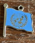 Vintage United Nations Flag Emblem Sterling Silver Enamel Charm — photo 2