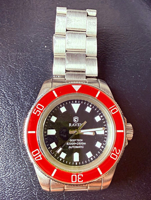 Raven Deep Tech Automatic Diver 2500m Black Dial Red Bezel Steel Bracelet