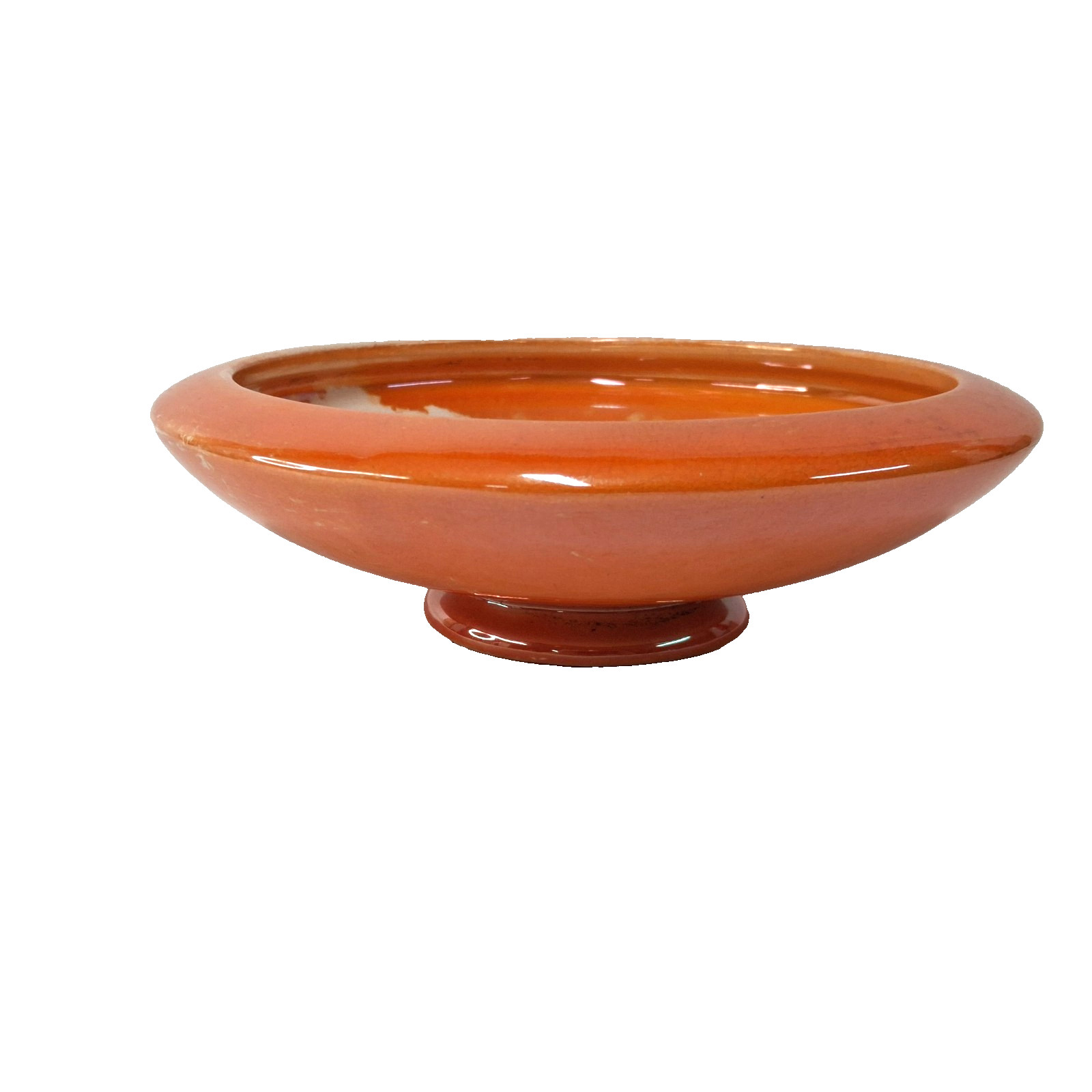 Pedestal ceramic console bowl with an orange glaze.