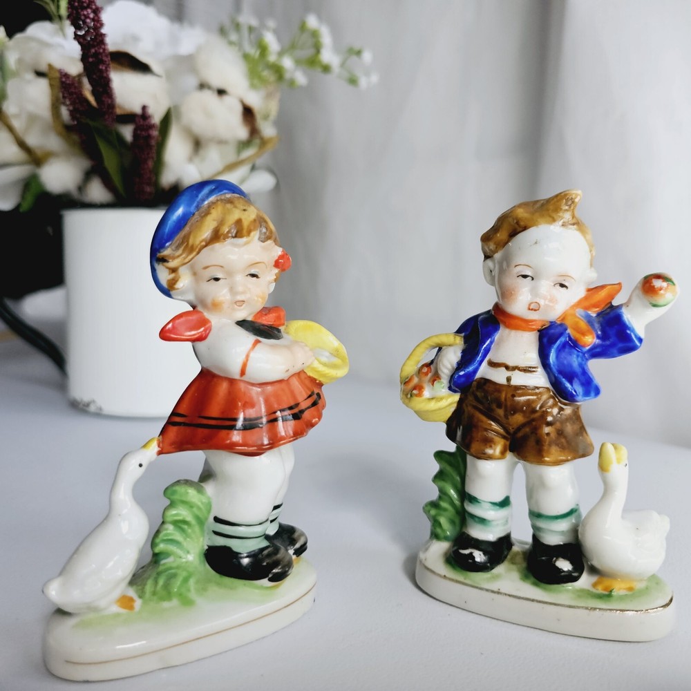 Pair of Vintage Boy & Girl figurines with a duck figurines,  vintage figurines,