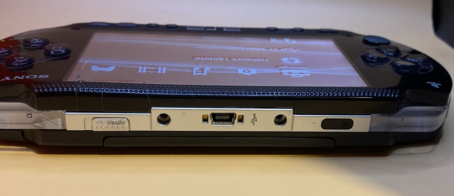 Sony PSP 1003 Handheld Game Console Complete With 3 Games & UMD Film