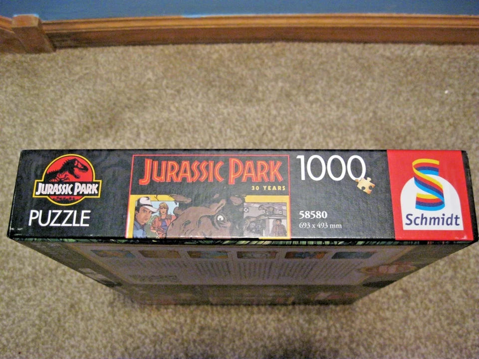 PUZZLE SCHMIDT 1000 PIEZAS 30 AÑOS DE PARQUE JURÁSICO: ¡LA VIDA ENCUENTRA UNA MANERA DE ECHAR UN VISTAZO! Foto 2 de 4
