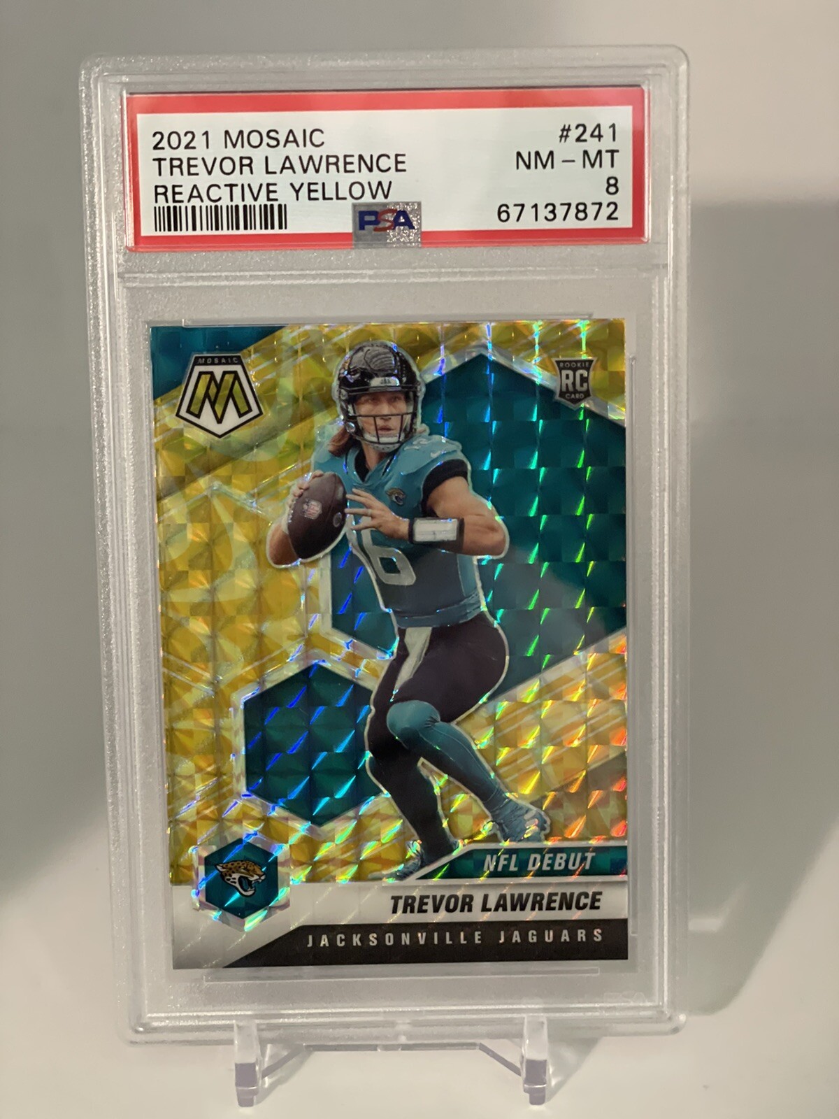 2021 Panini Mosaic Reactive Yellow Prizm #241 Trevor Lawrence RC Rookie PSA 8