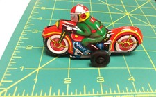 Vintage pull back Tin Toy Motorcycle made in Japan - Red Bike Green Suit, NEW 