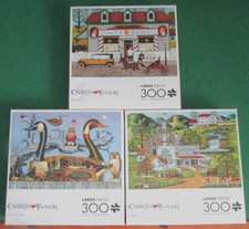 Lot of 3 Charles Wysocki 300 pc Puzzles- SLOW...