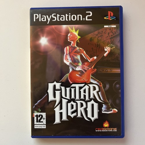 Guitar Hero (Sony PlayStation 2, 2006) COMPLETO - PS2