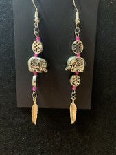 Elephant earrings with some pink
