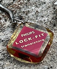 Philips Lock Fit Transistor keychain, vintage, rare, in amber lucite