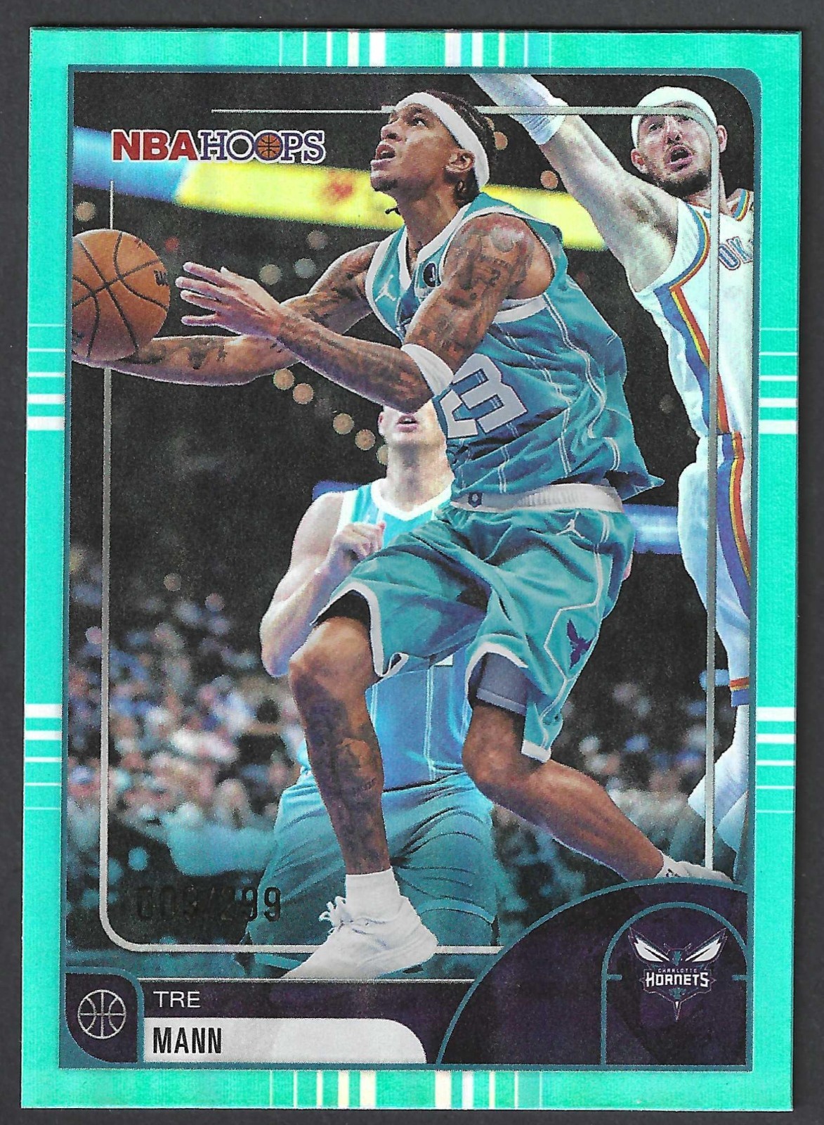 2025-26 NBA Hoops #127 Tre Mann Charlotte Hornets Teal Foil #/299