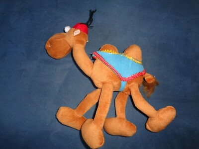 HUMP BACK TAN PLUSH TWO HUMP  CAMEL WEARING   AQUA SADDLE  RED HAT 