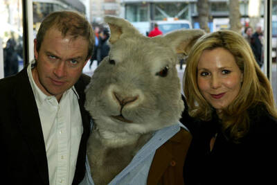 Comedians Harry Enfield and Sally Phillips arrive at the UK Premi- 2004 Photo
