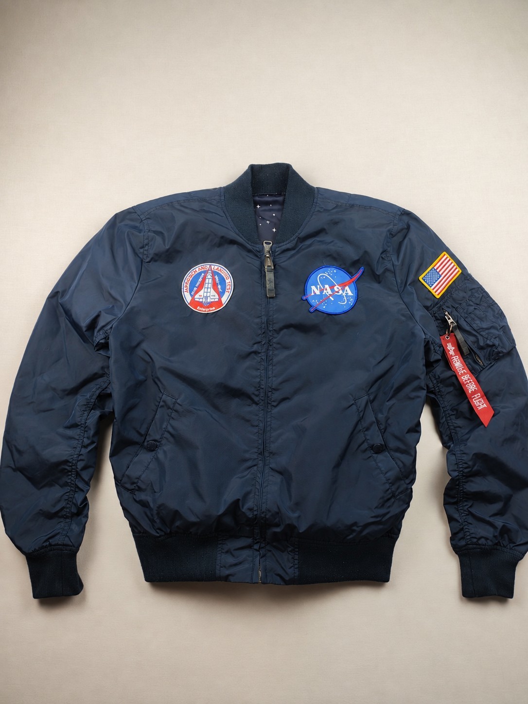 Chaqueta de bombardero azul oscuro Alpha Industries MA-1 TT NASA L