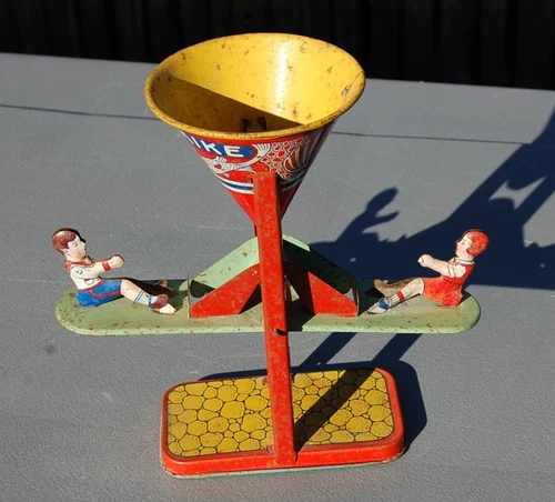 Vintage 1950’s J. Chein Tin Litho Toy.  See Saw Busy Mike Beach Sand Toy