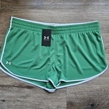 Under Armour XL Women's Fly-By running shorts in emerald green W/ white stripe.