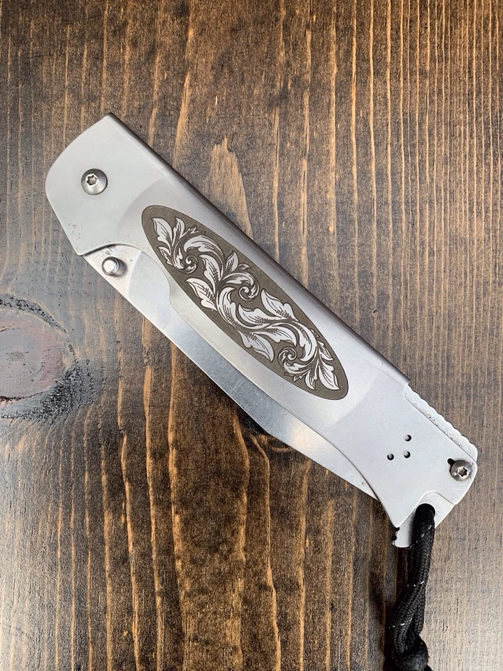 激光雕刻冷钢折叠布什曼口袋刀二手 — 第 2/4 张图片