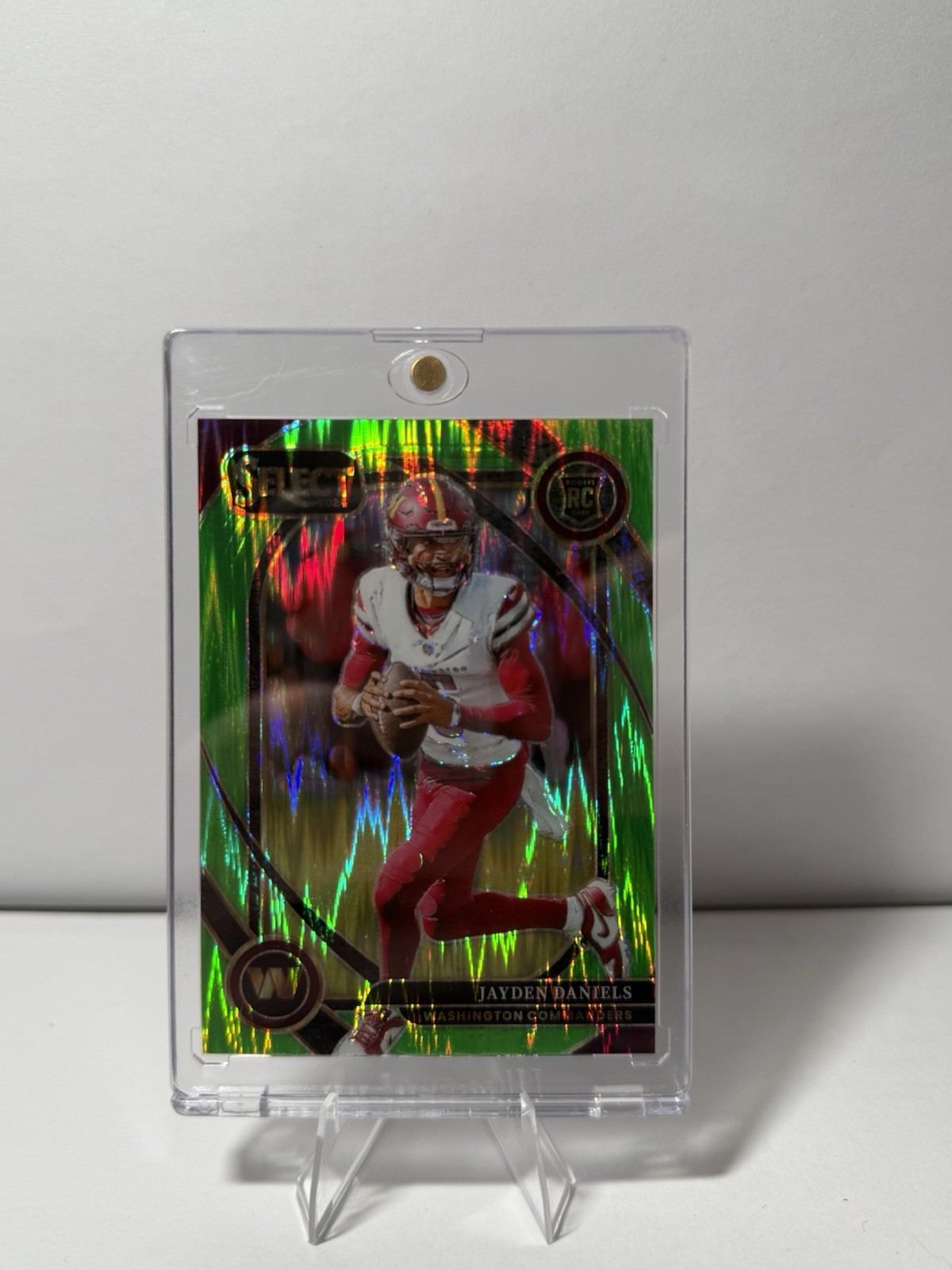 2024 Jayden Daniels Select Neon Green Shock Club Level Rookie /499
