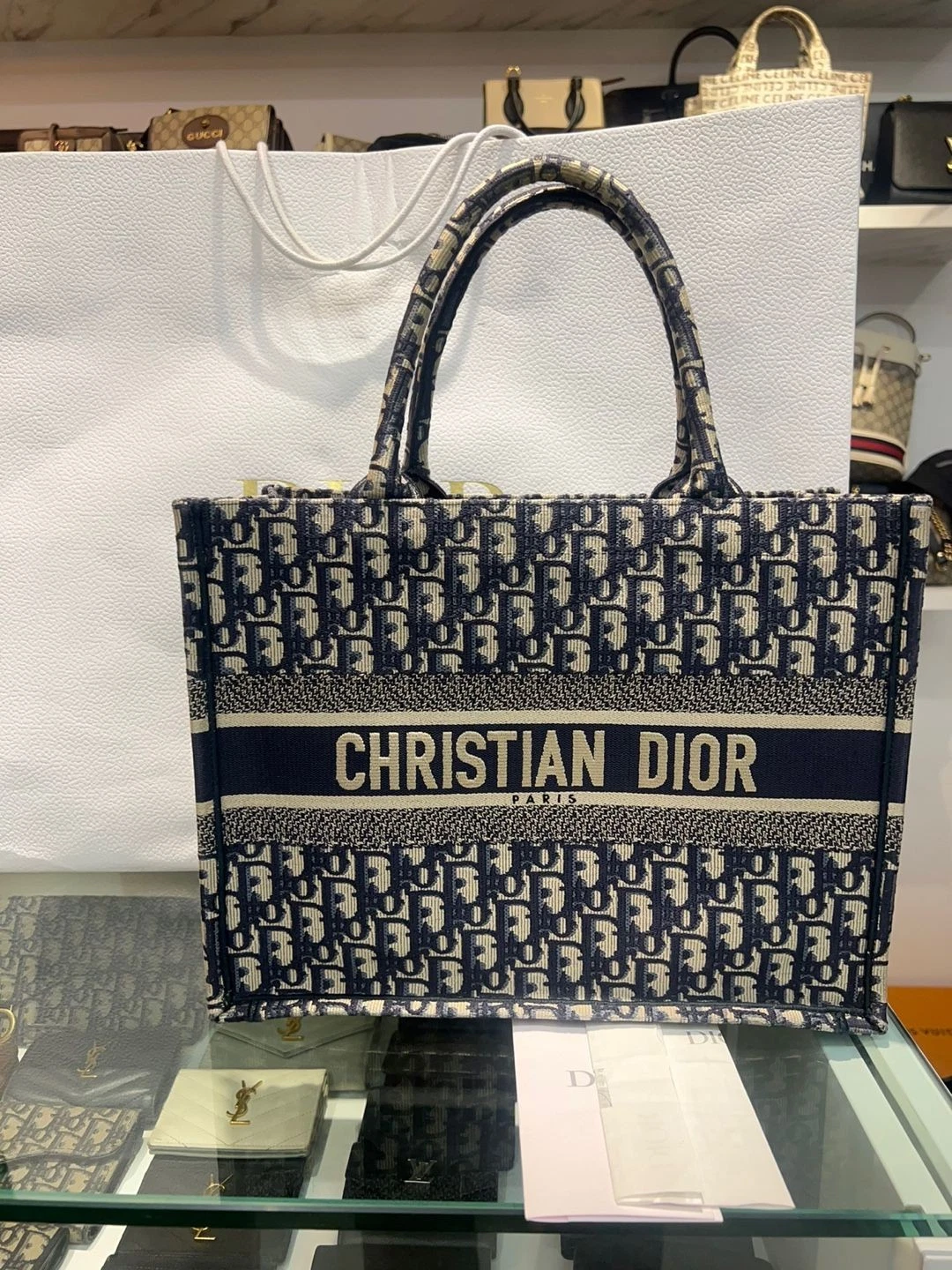 Sac fourre tout livre oblique Dior bleu moyen 133989713