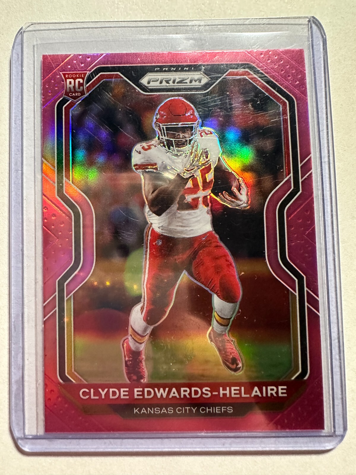 K34,675 - 2020 Panini Prizm Prizms Pink #328 Clyde Edwards-Helaire